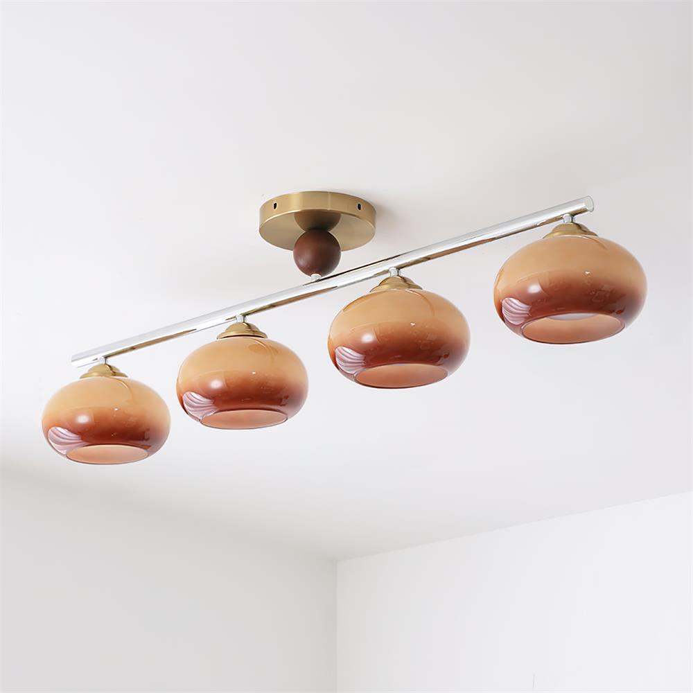 Lumière de plafond Aurora à quatre abat-jours en verre avec barre métallique