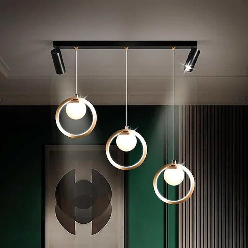 Suspension moderne en anneau métallique avec projecteur