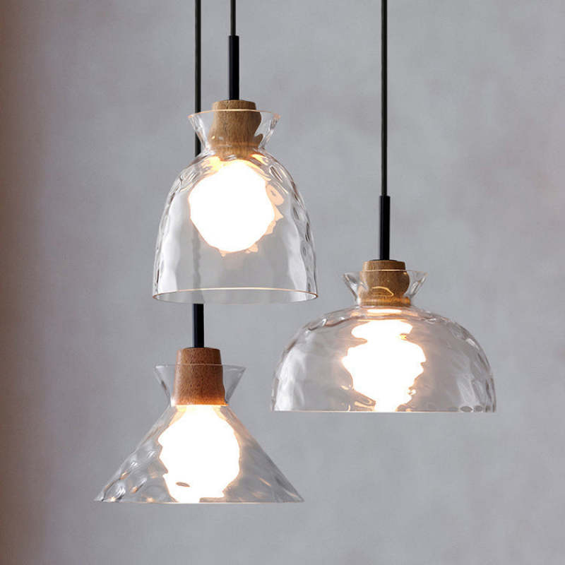 Geometrische glazen hanglamp die de eetkamer sfeer verhoogt