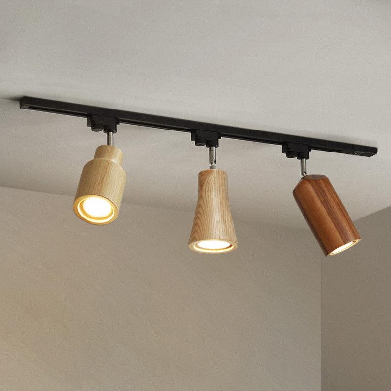 Wood Tone Ceiling Track Lighting With Three Adjustable Spotlight Heads